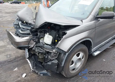 2010 Honda Cr-V Lx z USA, uszkodzony, nr VIN 5J6RE3H36AL012172